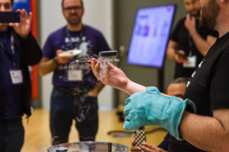 Quantum for Educators (QEd) participants watching a demonstration